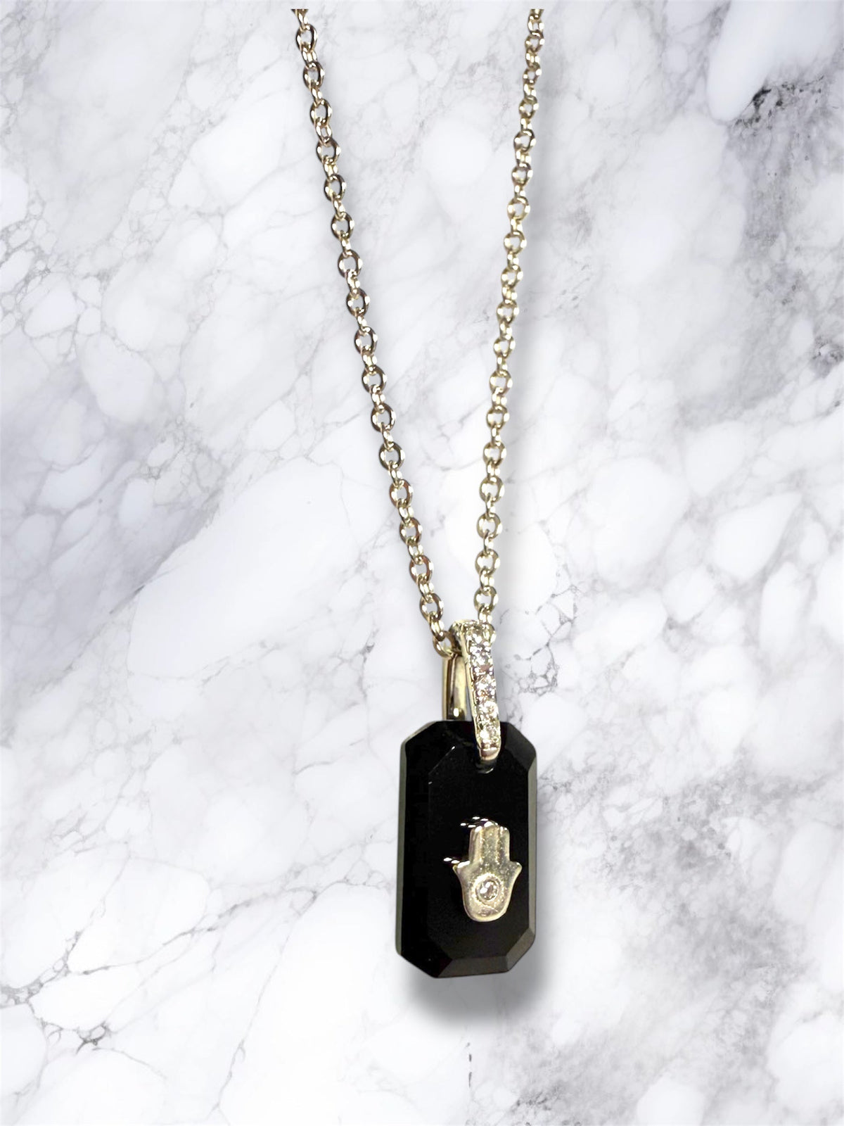 Black Onyx and CZ hamsa pendant sterling silver necklace